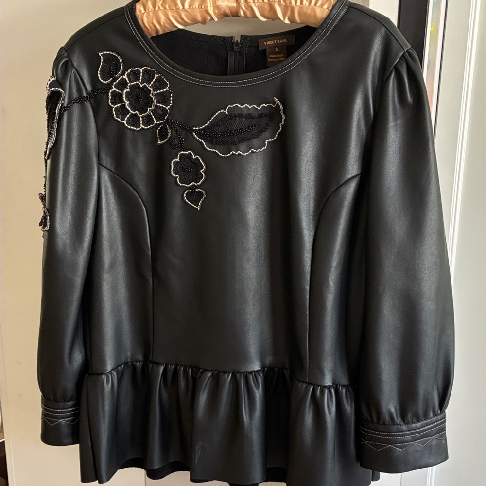 Vineet Bahl Black Faux Leather Peplum Blouse with Beaded Floral Accents.